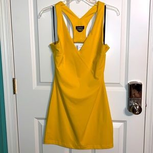 BeBe Dress. Brand New. Tags Attached. Yellow. Medium. V neck, Back Bow
